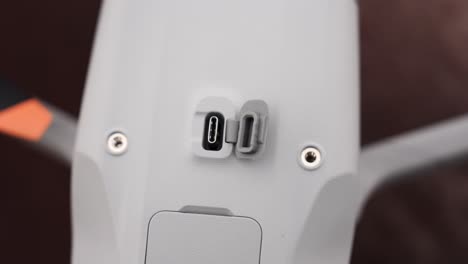 close-up of usb-c charging port on gray drone body