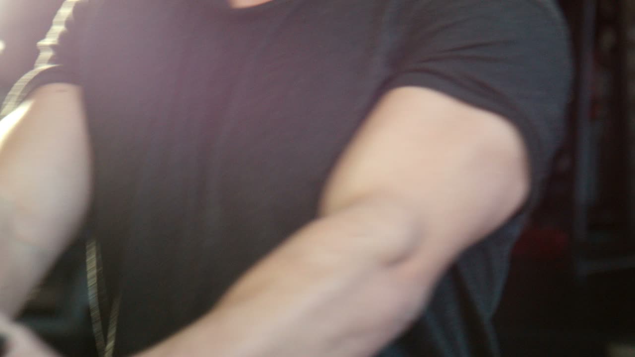 The Guy Is Engaged In a Gym On The Exercise