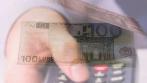 animation of euro banknotes falling over hand of caucasian man holding payment terminal