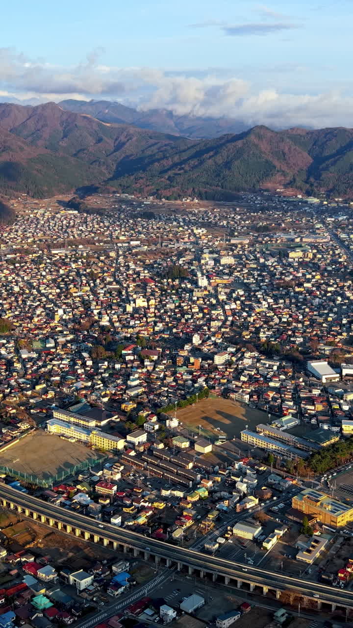 Aerial drone view of the Fujikawaguchiko town, Japan in daylight