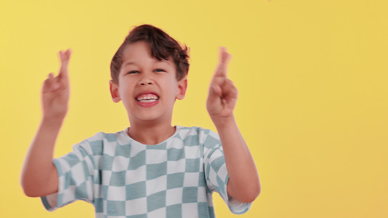 Boy with Fingers Crossed