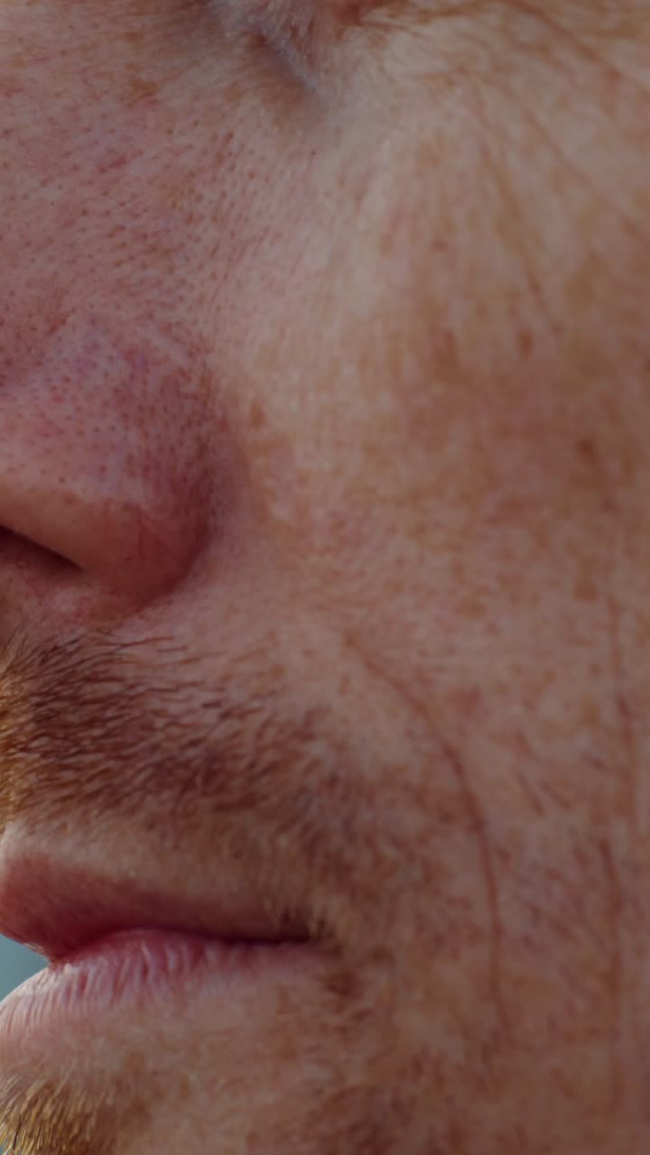 Close-up of a man's face and features