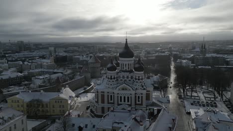 aerial view of the churches in the old town of tallinn, estonia in winter