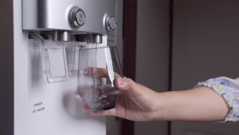 hand-pushing cup for pure water freshness for a healthy lifestyle