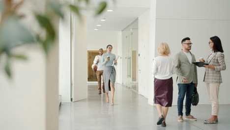 business people in a modern office corridor