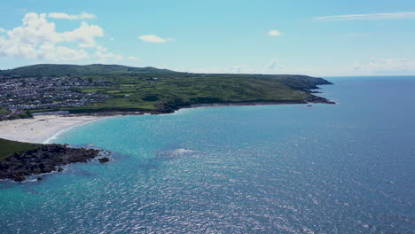 Aerial-drone-view-along-Porthmeor-beach-in-st-ives-Cornwall