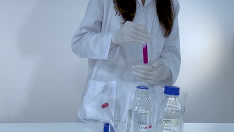scientist performing a chemistry experiment in a lab