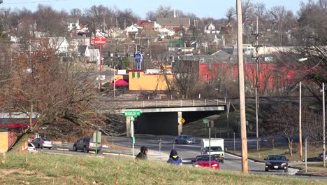 Two-young-African-American-boys-walk-on-a-hill-above-the-town-of-Ferguson-Missouri-1