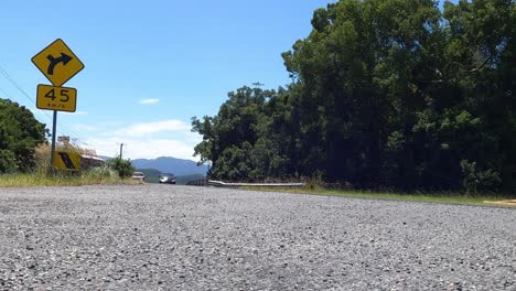 vehicle travels along a picturesque rural route