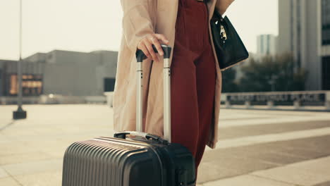 hand, suitcase and closeup of businesswoman