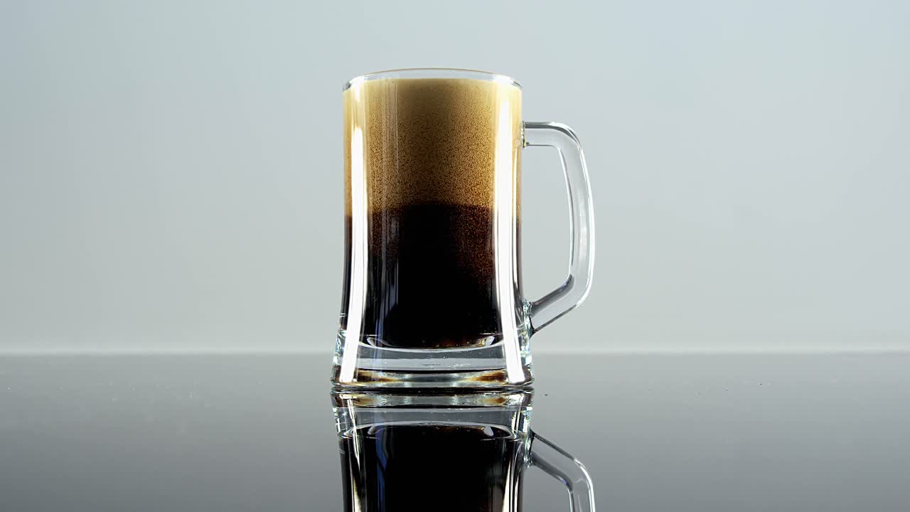 Pint of beer on grey background for st patricks