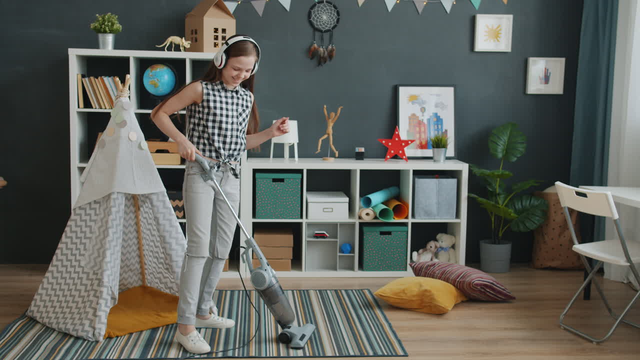 Girl cleaning her room while listening to music
