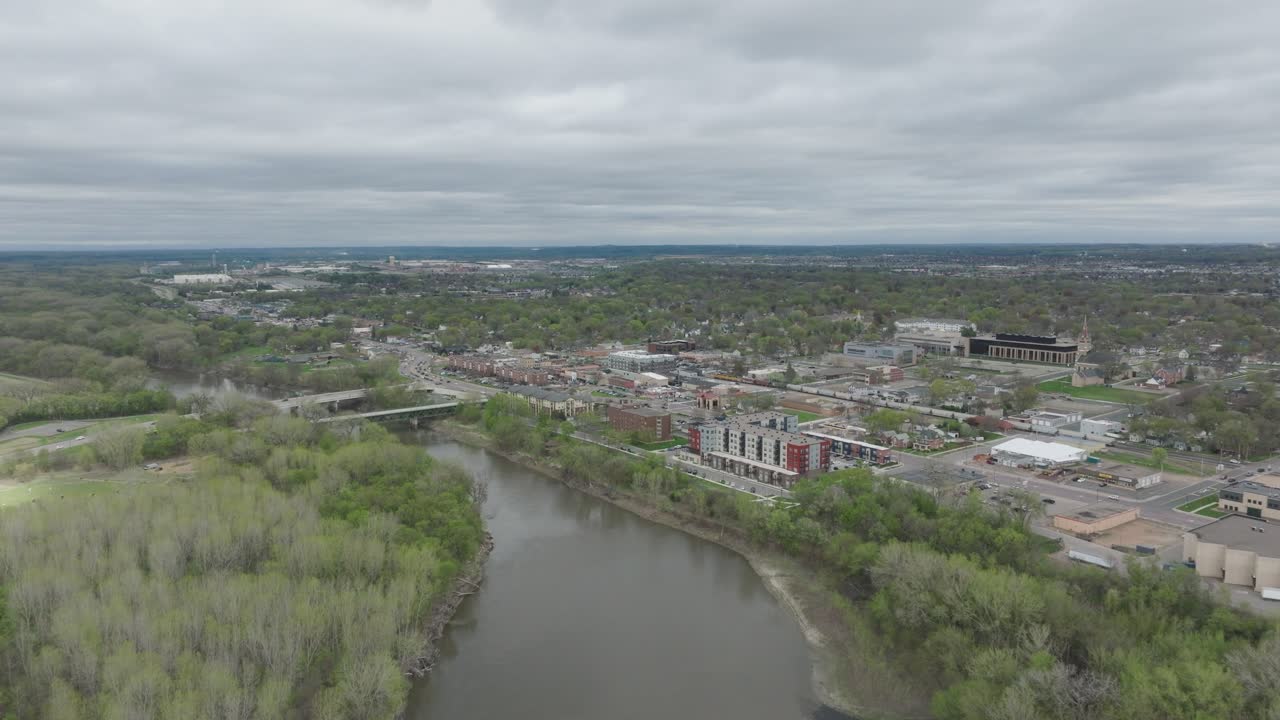 Flying Over Minnesota River Towards The Downtown Shakopee In Minnesota, USA. - aerial shot