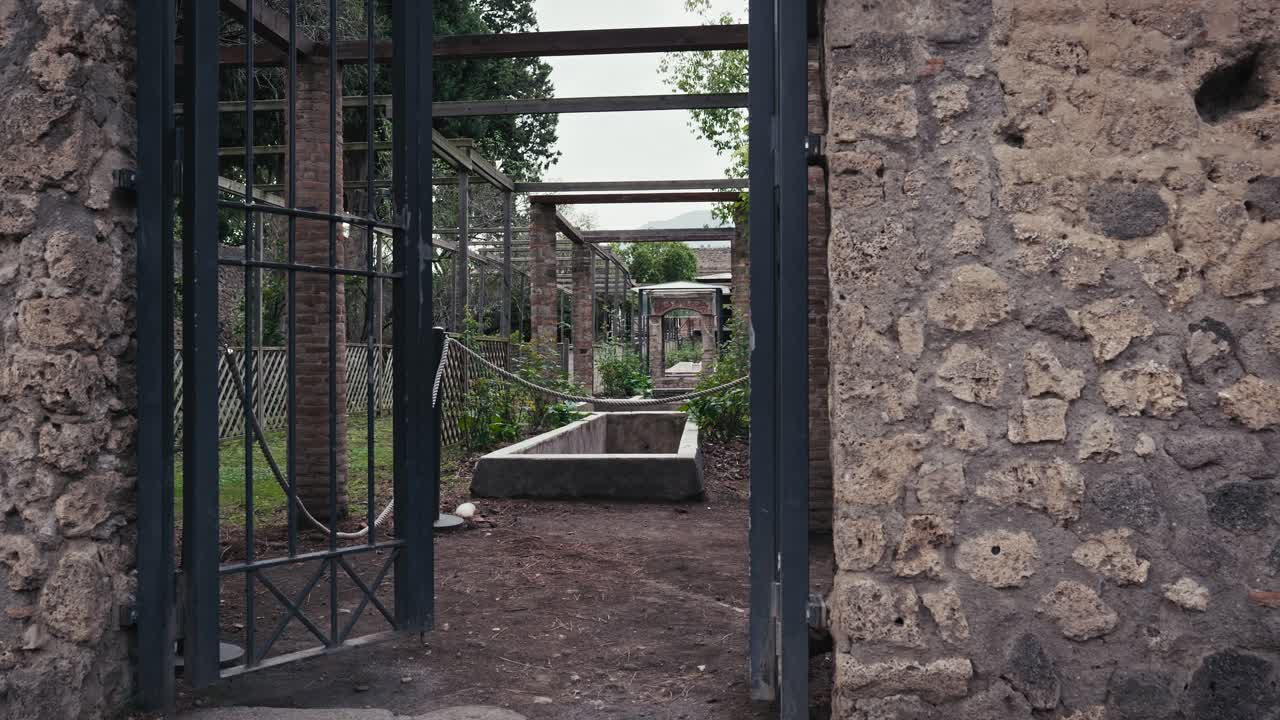Ancient gate to Quartione's abode, Pompeii, Naples, Italy