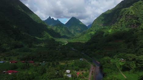 Aerial View of a Lush Tropical Valley and Village