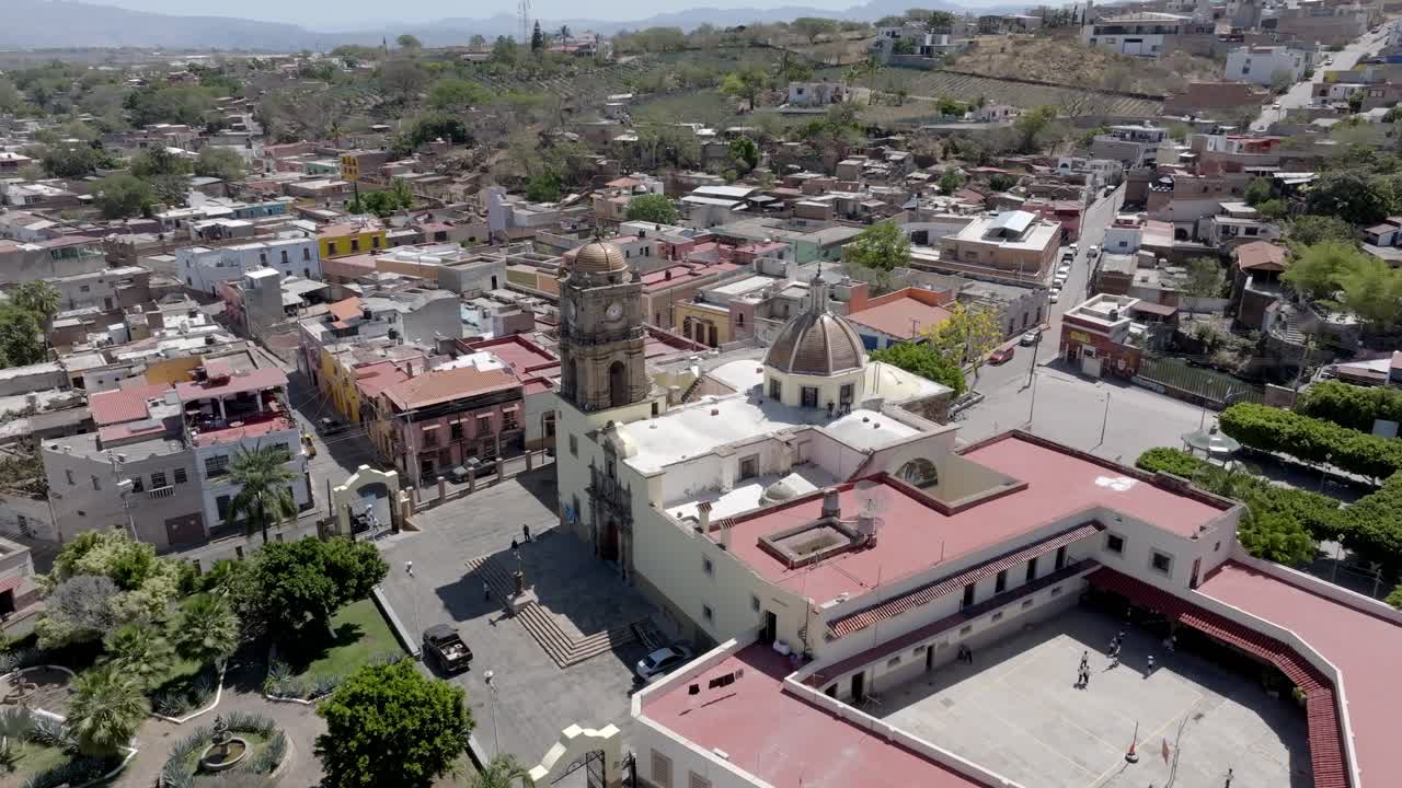 Parish of the Immaculate Conception catholic church in Amatitan in Mexican state of Jalisco, Blue agave farm fields in background, Drone
