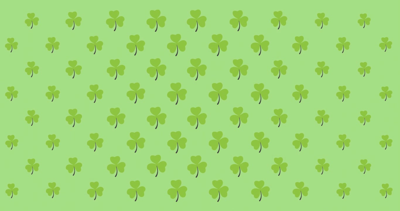 Animazione digitale di molteplici foglie di trifoglio che si muovono su sfondo verde.