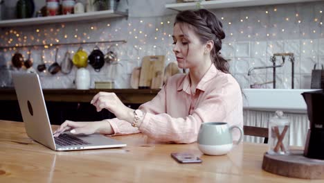 woman working from home in the kitchen