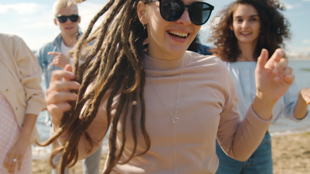 Friends Dancing on the Beach