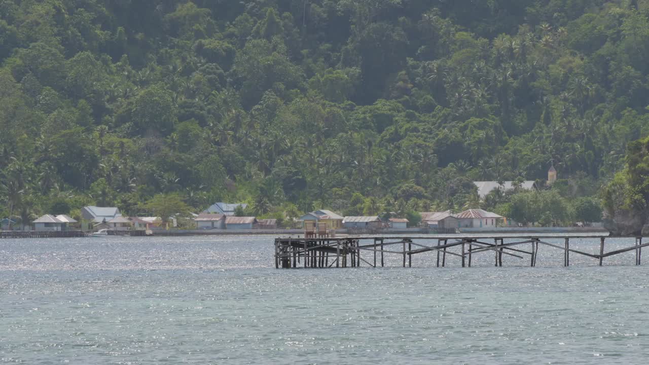 Tranquil Tropical Island Village with Wooden Pier