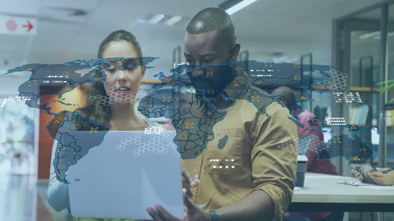 Coworkers pointing at document after map overlay fading in and showing business data insights