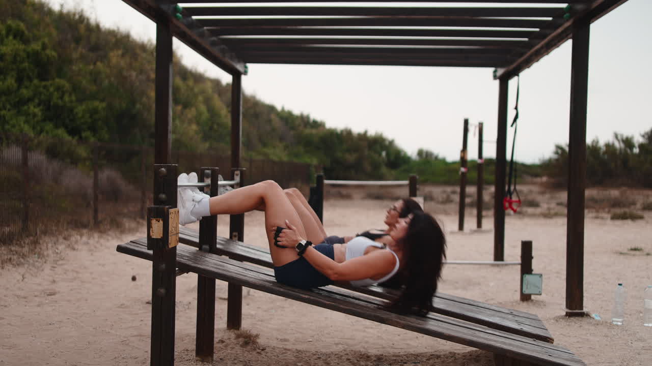 Women Exercising on the Beach