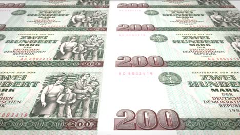 billetes de doscientos marcos alemanes o marcos alemanes del banco de la antigua república alemana rodando en la pantalla, monedas del mundo, dinero en efectivo, bucle