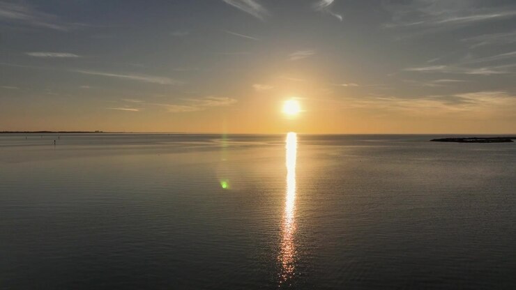 Tramonto su Gulf Shores, Alabama, vicino al fiume Bon Secour