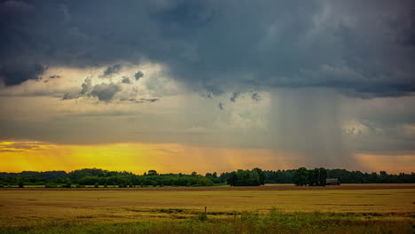 Time-Lapse-of-Dark-Rainy-Clouds-and-Stormy-Rainfall-Above-Rural-Countryside-Landscape