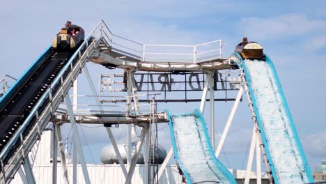 people enjoying a thrilling water coaster ride