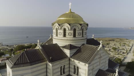 aerial view of a beautiful orthodox church with sea view