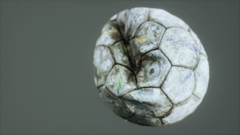 old deflated leather soccer ball