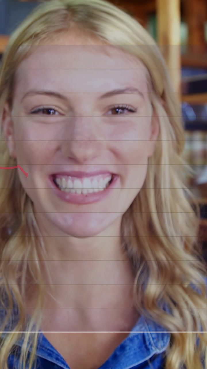 Vertical video: Cam rising revealing smiling woman chart overlay over her showing tomato sales
