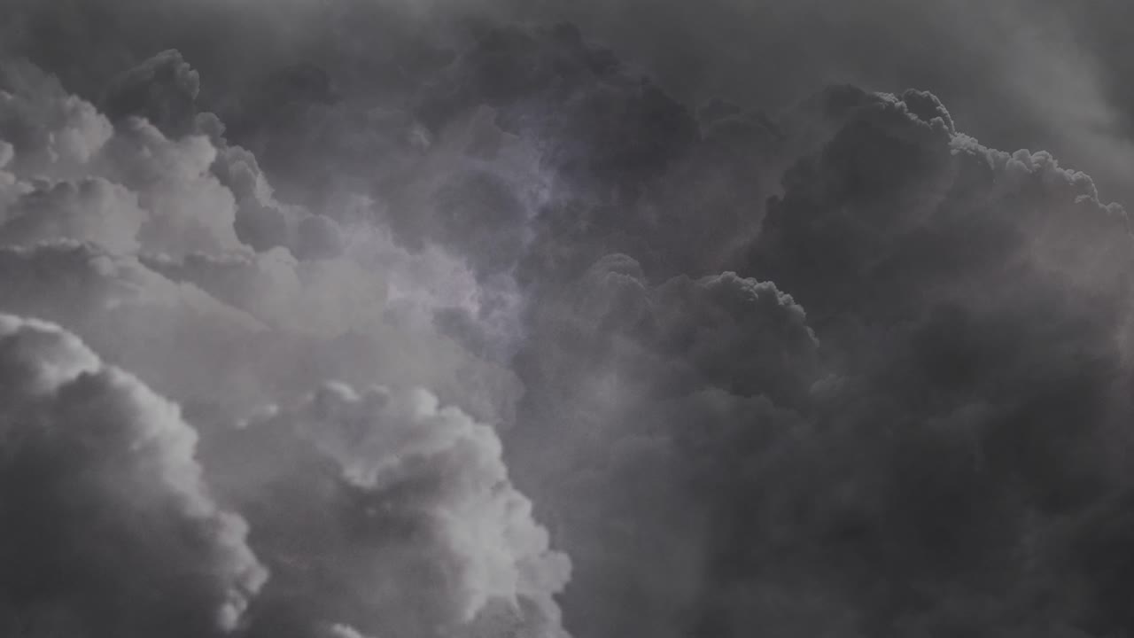 POV thunderstorm, dark and white cloud in the dark sky
