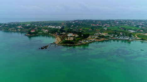 Calm-Mediterranean-waters-along-Arenella-coastline,-Syracuse,-Italy