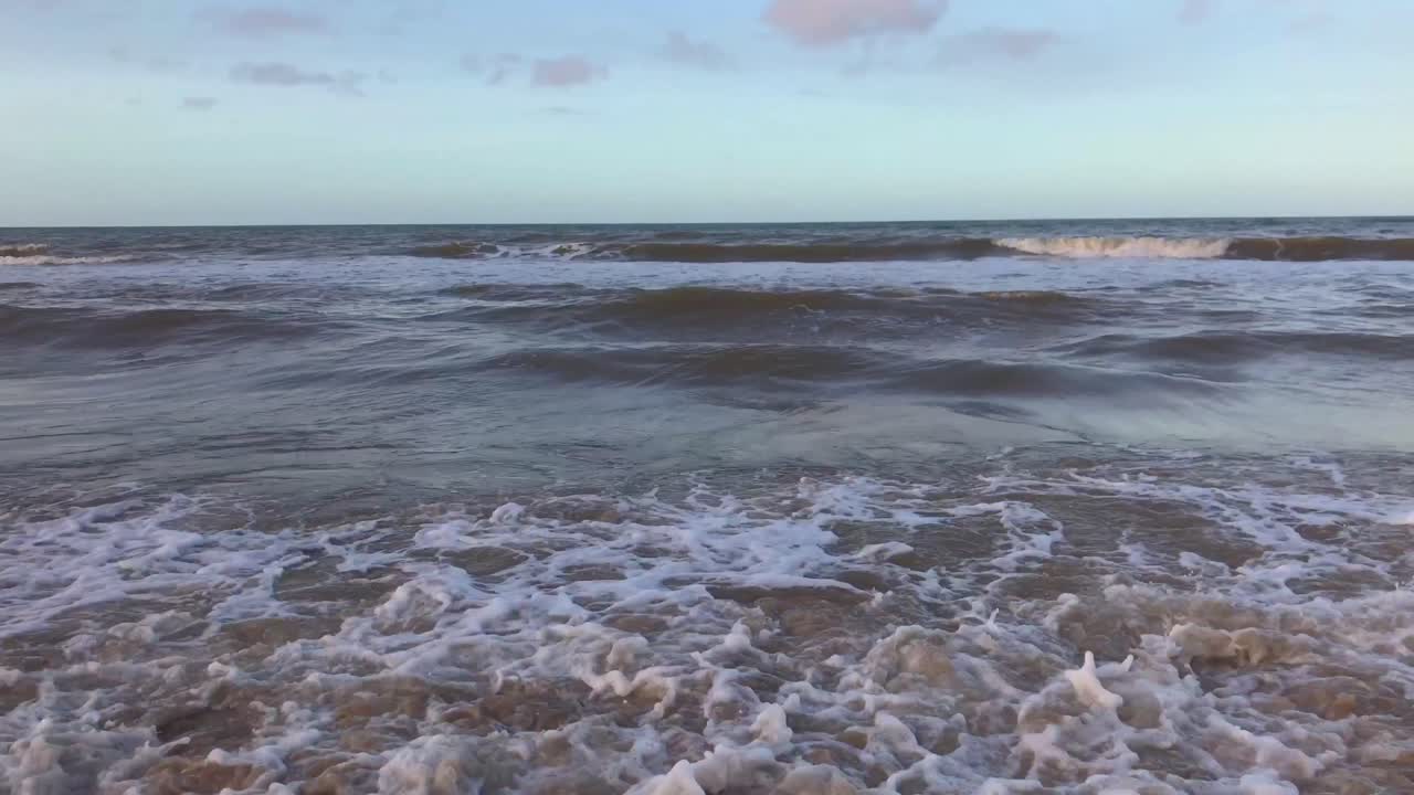 Waves on a sandy Caribbean Sea beach