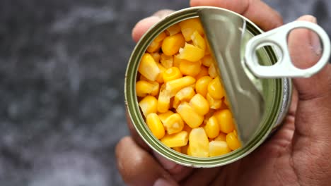 open can of canned corn