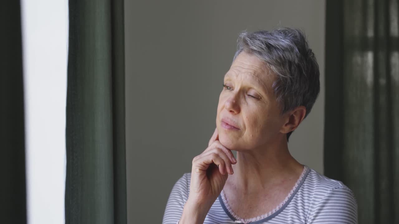 Senior woman at home alone