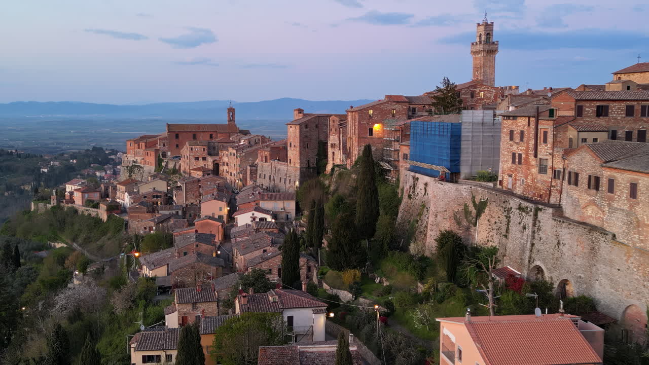 Aerial drone view of the Montepulciano medieval hilltop town in Tuscany, Italy, surrounded by vineyards