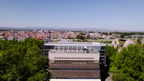 Aerial-cityscape-view-of-the-convention-center-in-Perpignan,-France-during-a-sunny-day