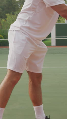 tennis player doing a service