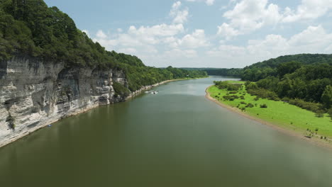 scenic aerial view of beaver lake, arkansas on a sunny day with lush greenery and calm waters