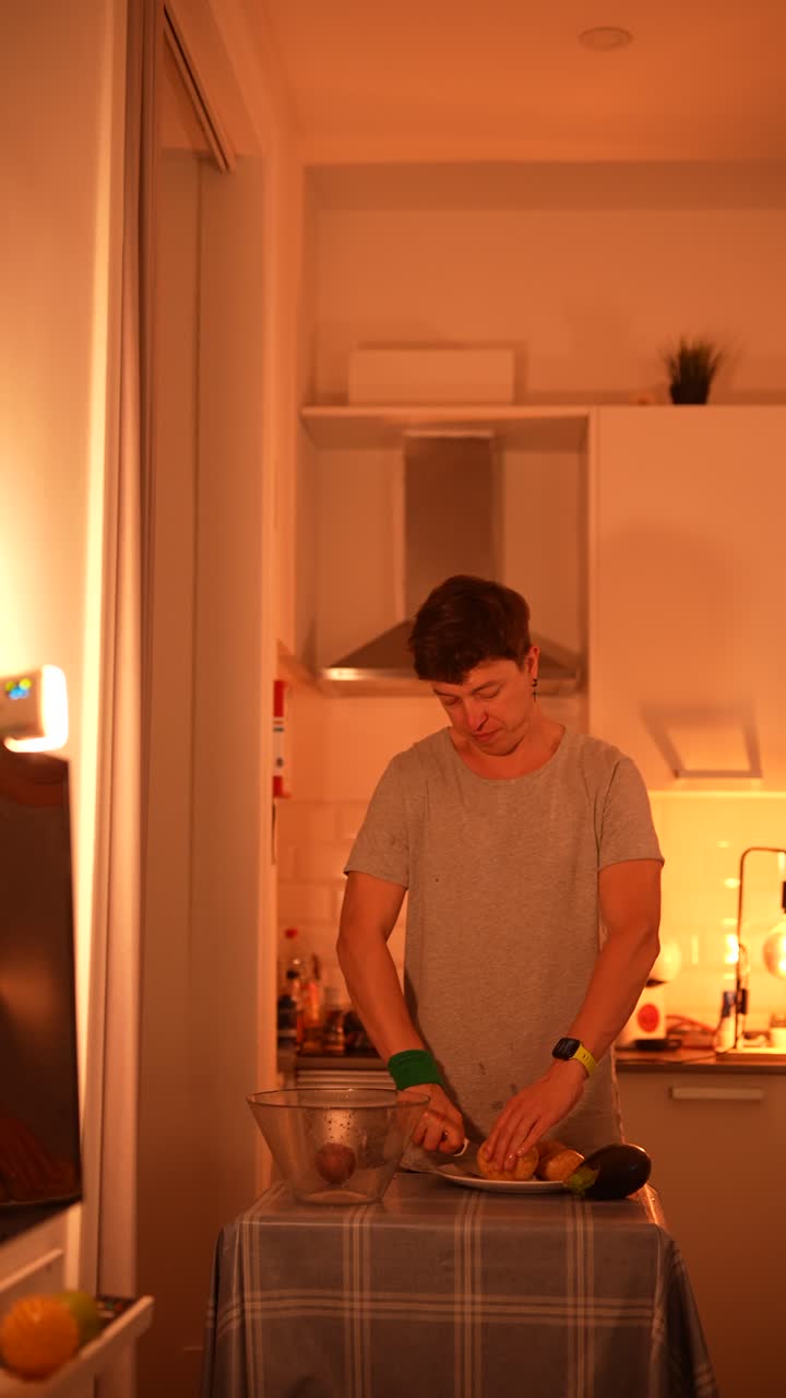 Man Preparing Vegetables in a Kitchen