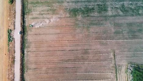 A-drone-shot-from-a-great-height-of-a-tractor-plowing