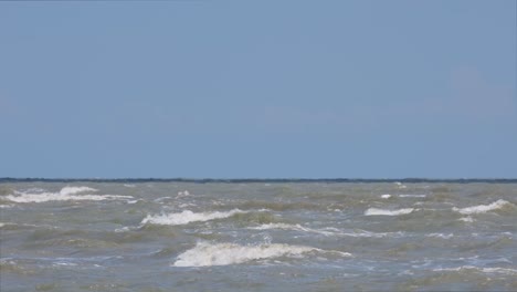 Beautiful-blue-sky,-big-waves-rushing,-rough-ocean-during-a-sunny-day,-perfect-for-ASMR-videos