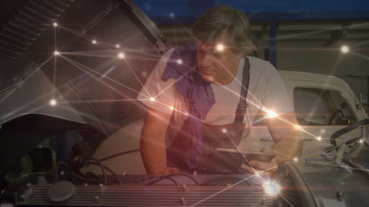 Mechanic tapping tablet activating overlay for automotive diagnostics tracing wiring swiping phone