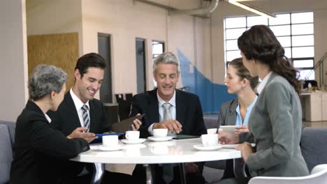 business people drinking coffee