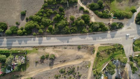 Top-down-drone-shot-of-a-rural-roadway-in-Spain's-countryside