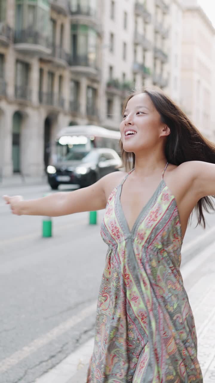 Woman posing on a city street