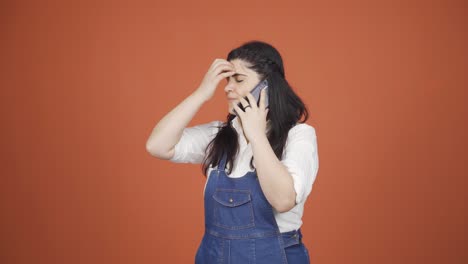 angry woman talking on the phone.